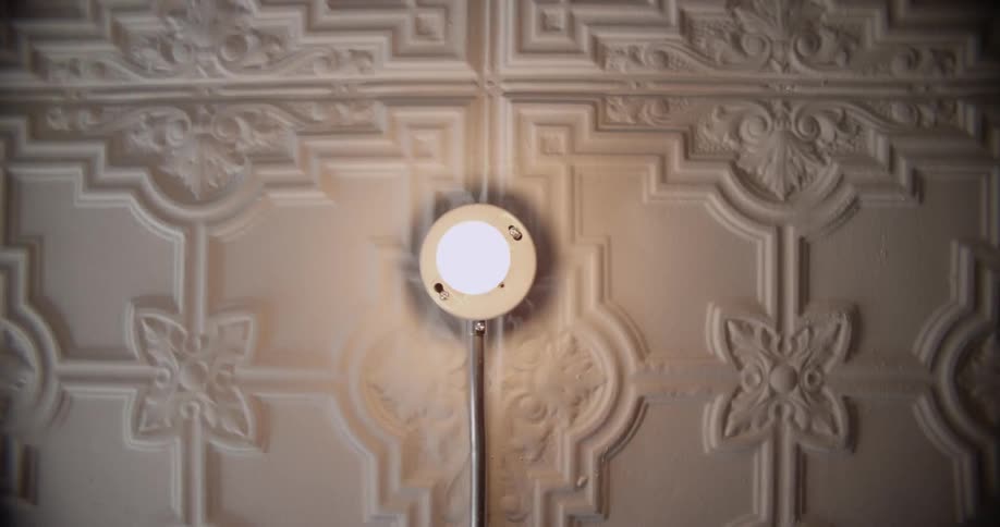 The light on the ceiling is blinking slowly