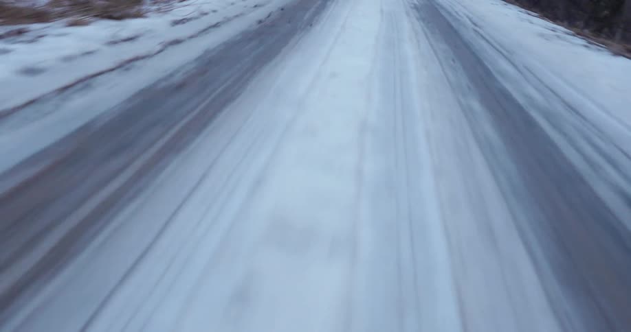 Traveling on a snow covered road