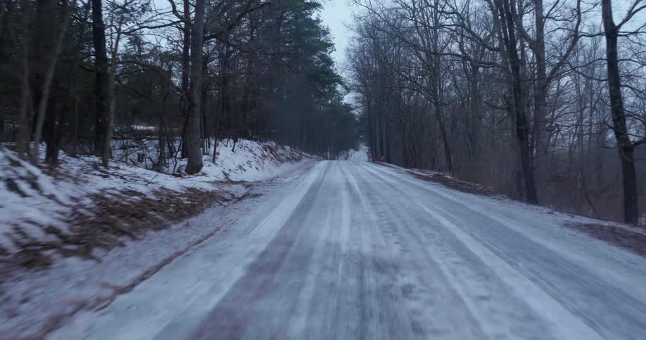 Snow covers a rural road