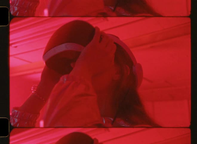 Girl uses virtual reality glasses as a flashing light blinks