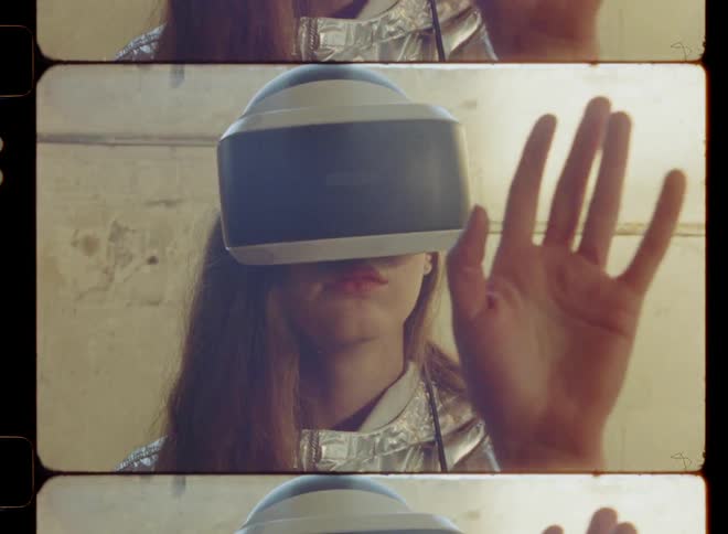 A woman experiences virtual reality