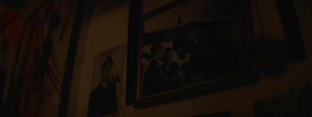 Framed picture of two men shaking hands