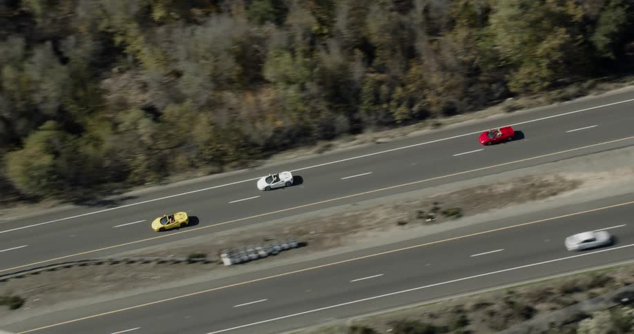 Convertible Lamborghinis cruising in southern california