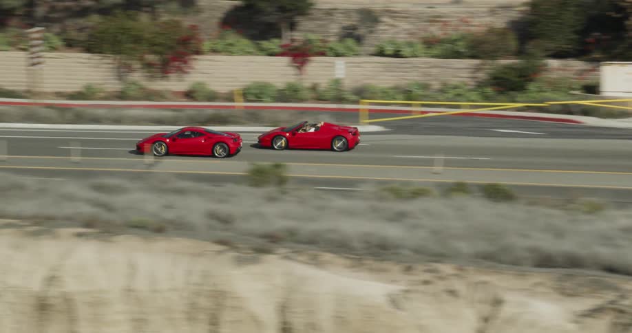 Lamborghini and Ferrari race on the Pacific Coast Highway, PCH