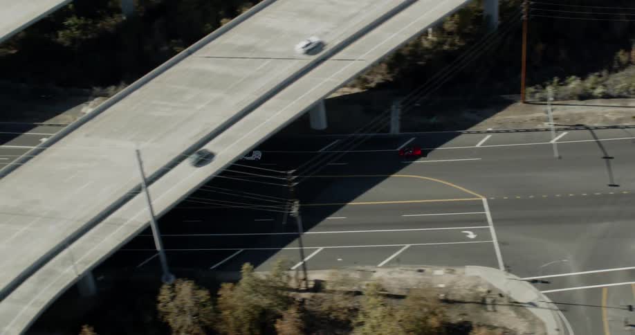 The highway is busy with cars traveling all over