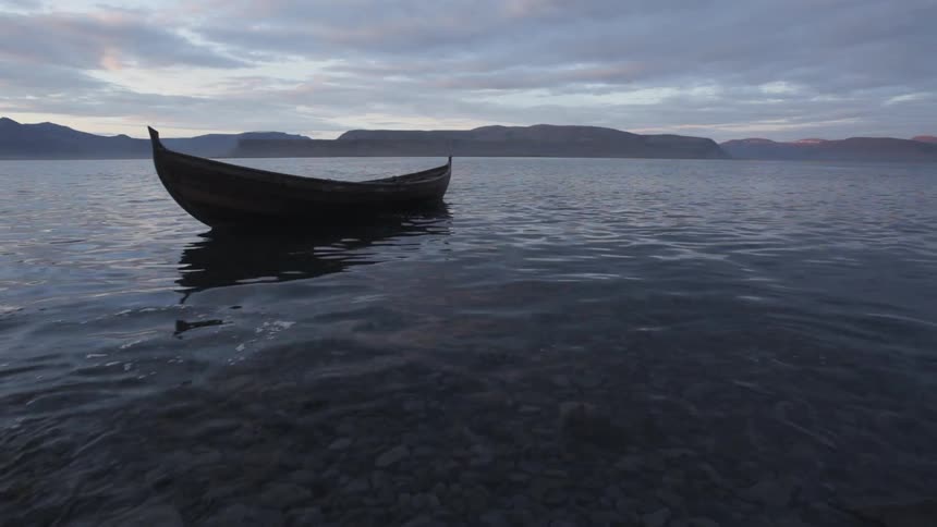 A canoe floats on the water
