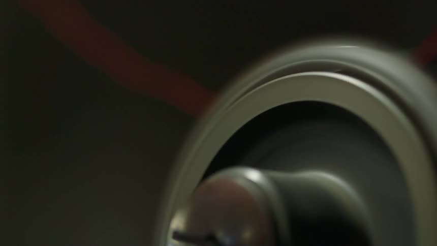 A wheel with fabric attached spins rapidly