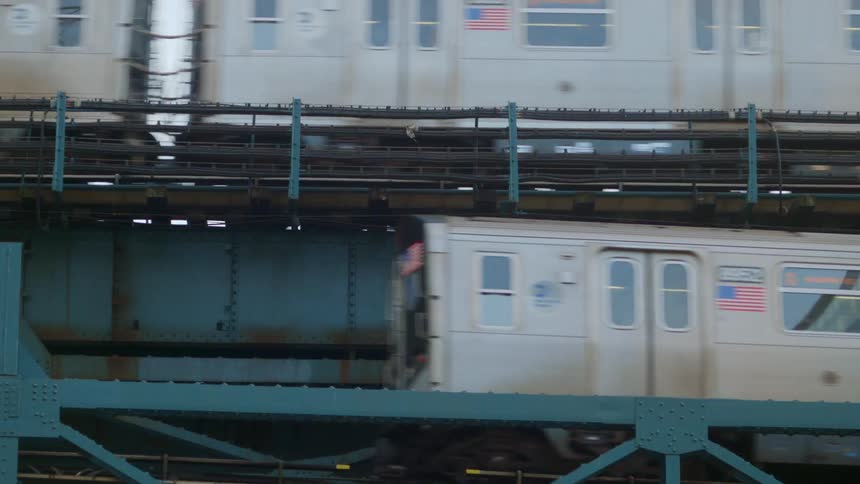 The trains are moving side by side in different directions