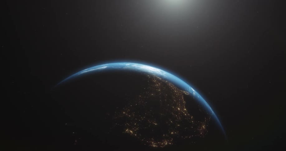 The sun rises over North America from space