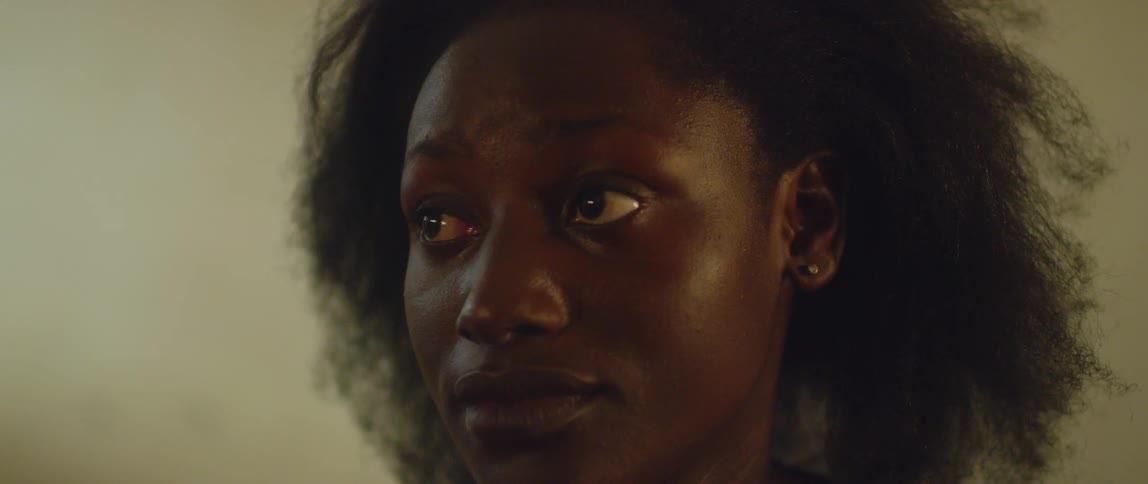 Woman looking sad and gloomy in a room