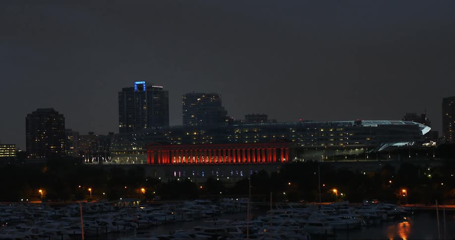 An arena inside the city is lit up at night