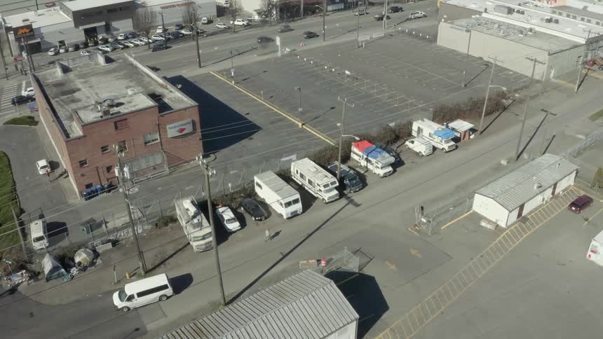 A van turns on a city road