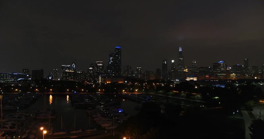 City buildings and skyscrapers lit up at night