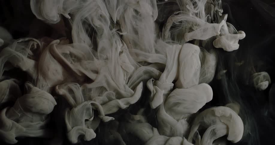 Clouds of gray and white flow and sink into liquid