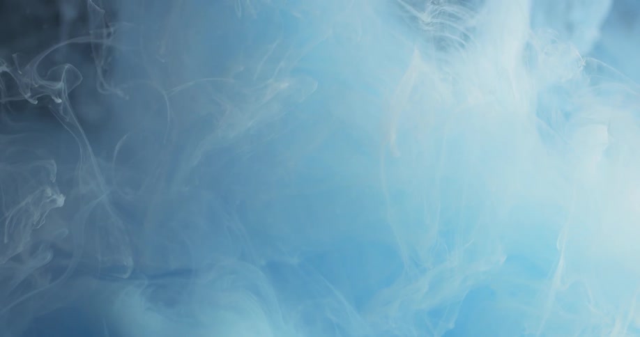 Blue and white liquid mix together
