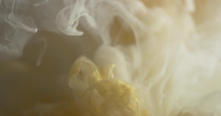 White and yellow liquid mix together