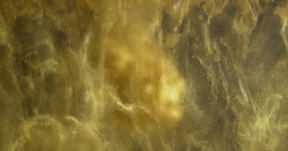 Clouds of yellow dye expand and sink in liquid