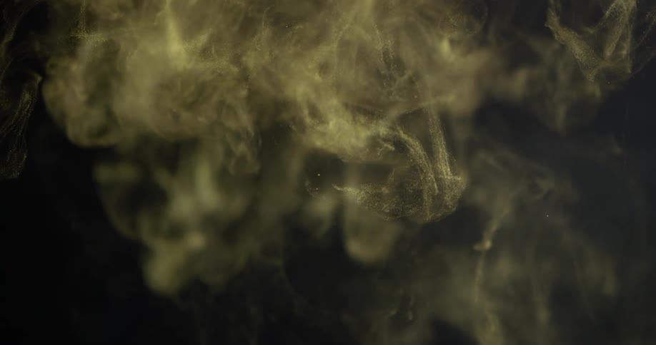 Clouds of white expand and sink in liquid