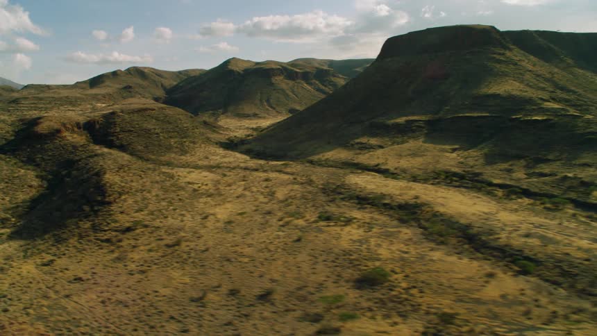 Green hills and ridges on a sunny day