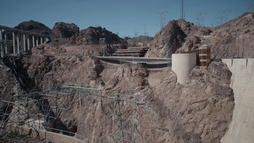 A dam and bridge built in the hills