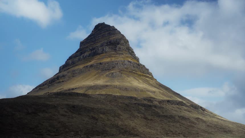 Bare mountain peak on cloudy day