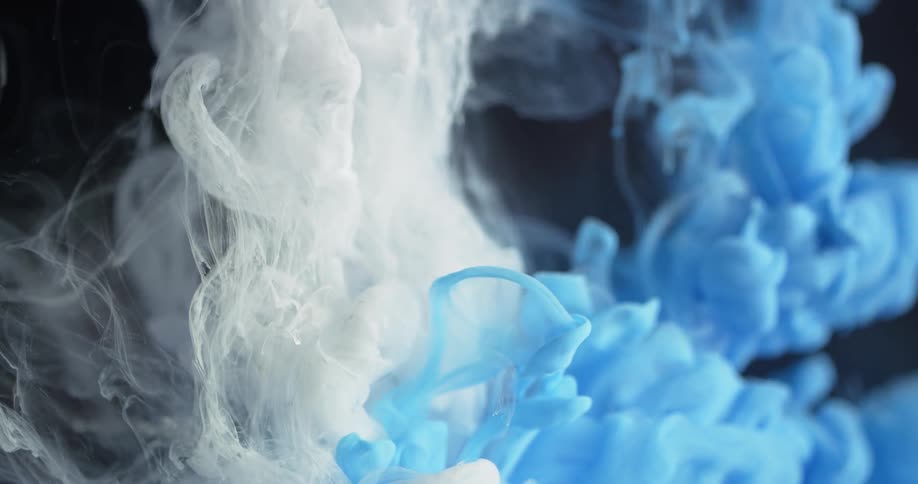White and blue liquid mix together
