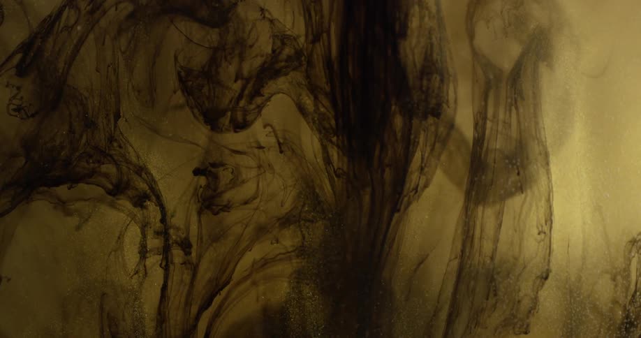 An abstract of different color liquids swirling
