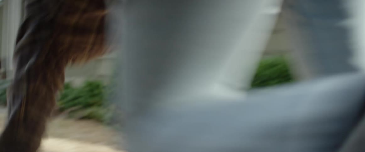 Man falls to the ground then gets up and runs in neighborhood
