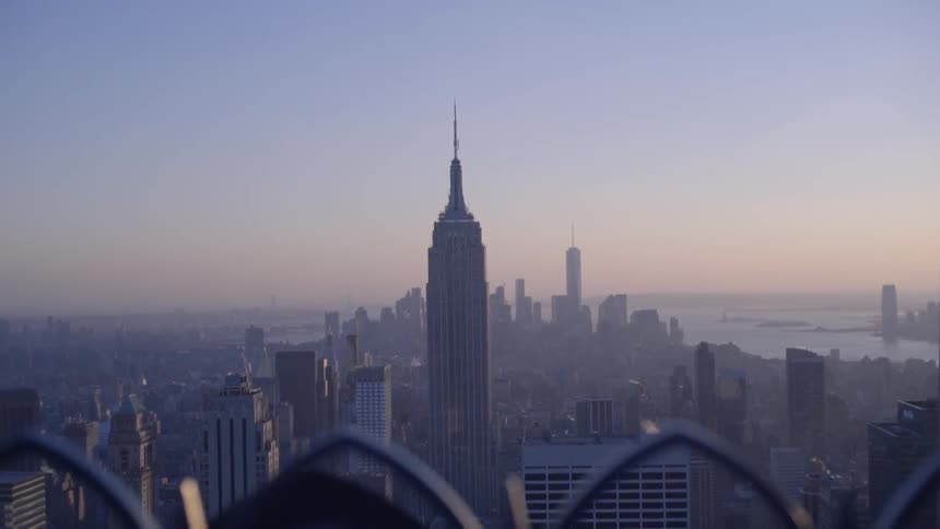 A city is shown through the haze