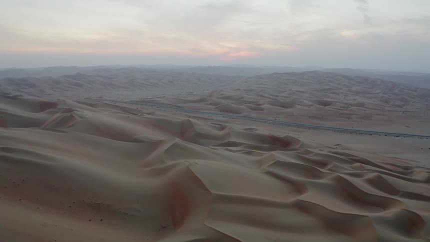 Dunes cover a sandy desert