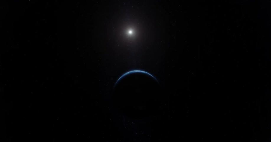 The sun illuminates part of the earth in the vast darkness of space