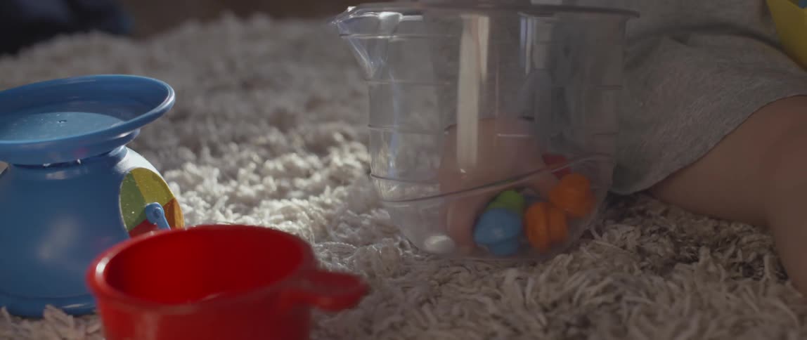 A toddler plays with toys