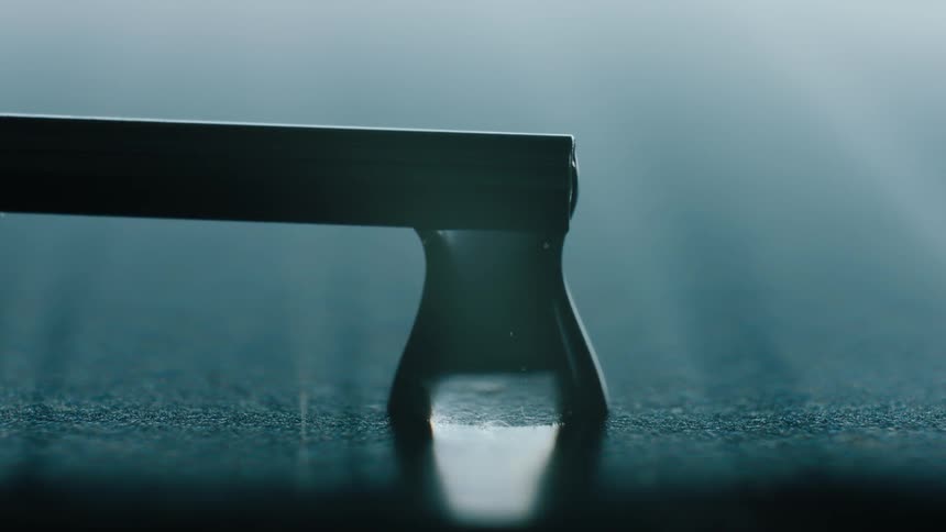 A water droplet is dripping