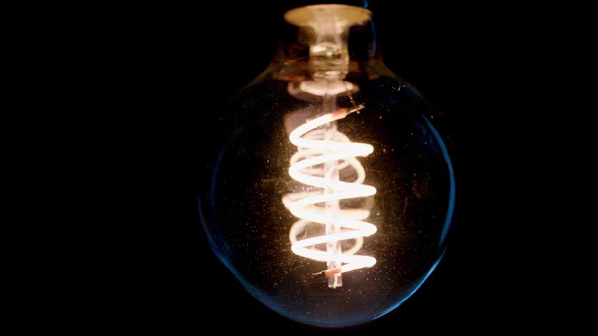 The element in a clear bulb glows