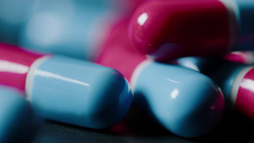 Prescription pills sit on a table