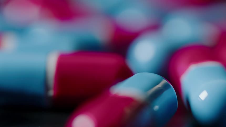 Prescription pills sit on a table