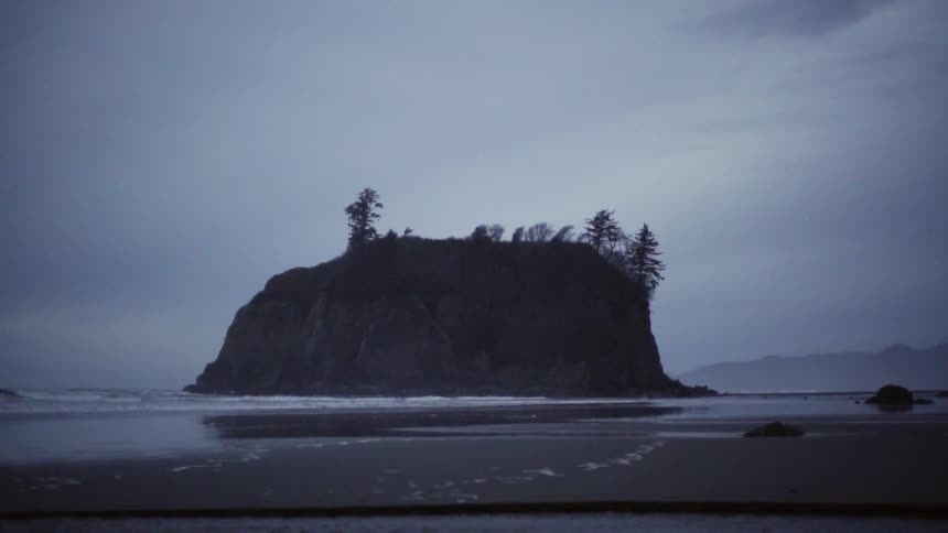 A stone island amidst the waves