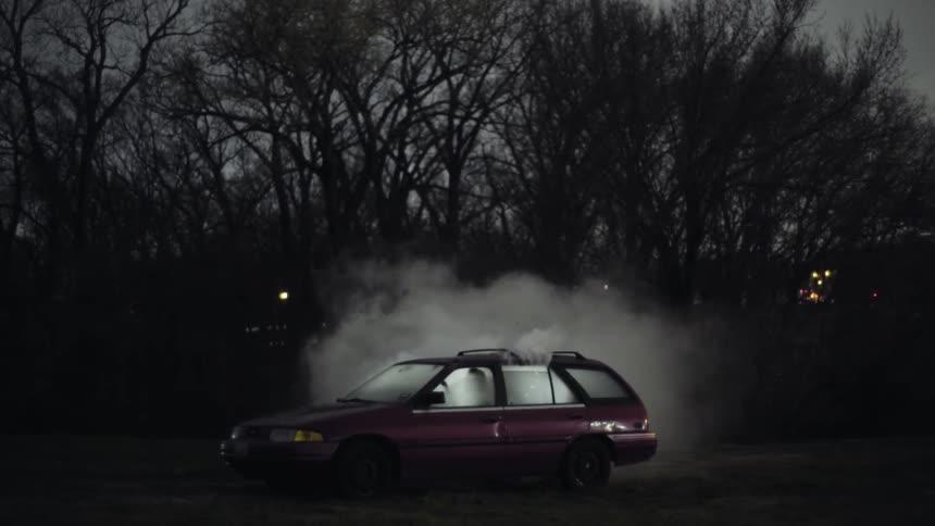 A car fills with smoke