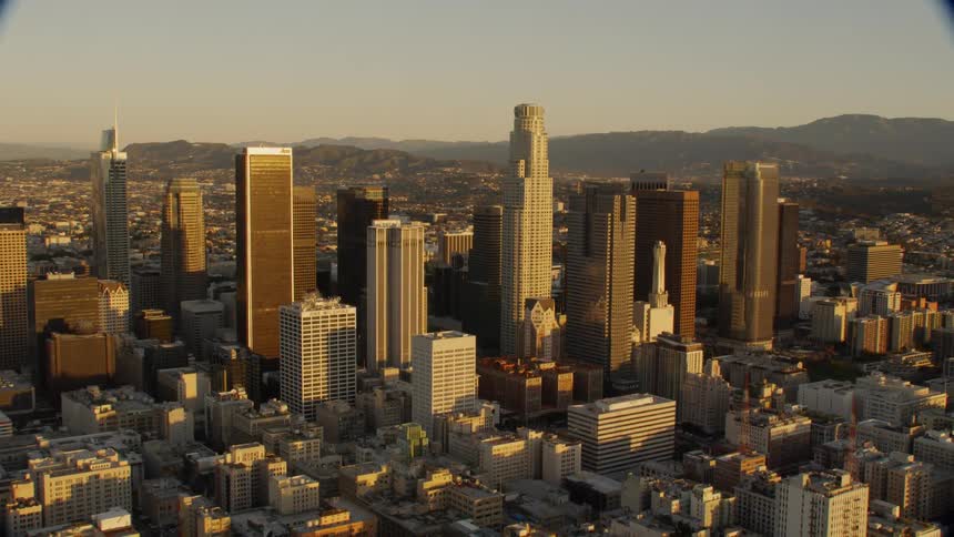 Aerial view of Downtown Los Angeles skyline at golden hour