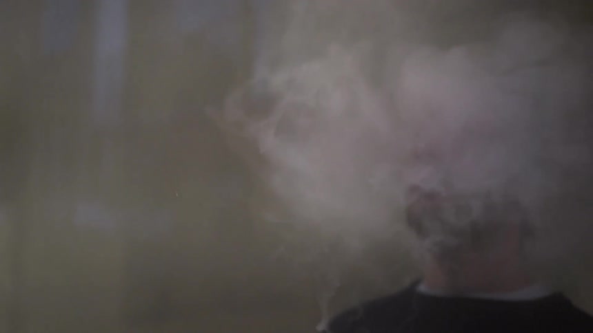 Fog is rolling across a man