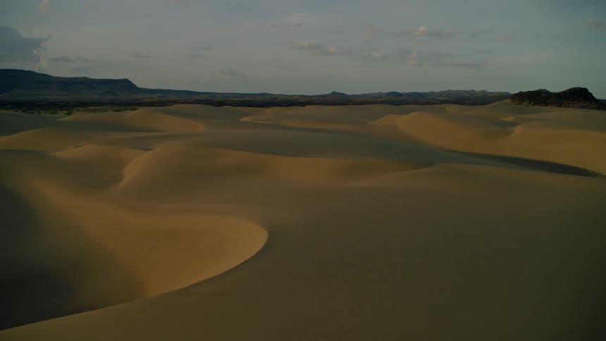 Sand dunes in a desert landscape