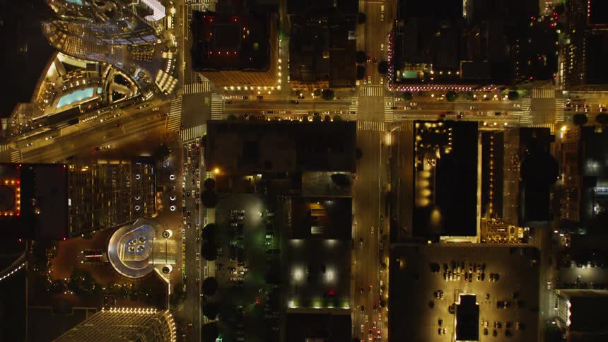 Top down bird's eye view of a city at night
