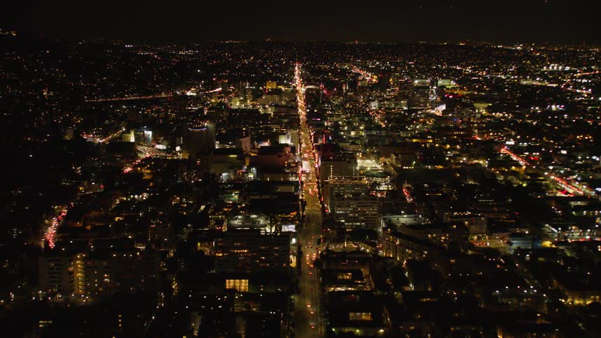 City buildings shine in the night