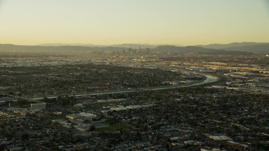The Los Angeles River curves through the city at sunset