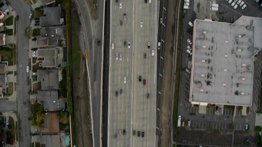 Top Down Birds Eye View of Cars driving on a busy freeway