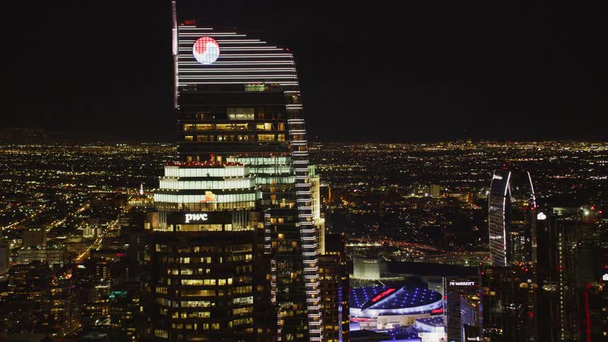 Lights are shining in buildings and skyscrapers in a city at night