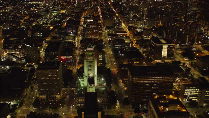 Buildings stand in a city at night