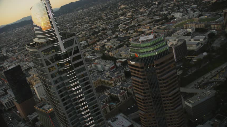 Trippy views while flying through Downtown Los Angeles at sunset