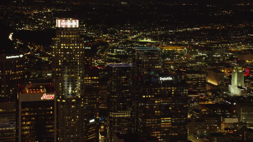 City skyscrapers illuminate the night sky; Downtown Los Angeles at Night