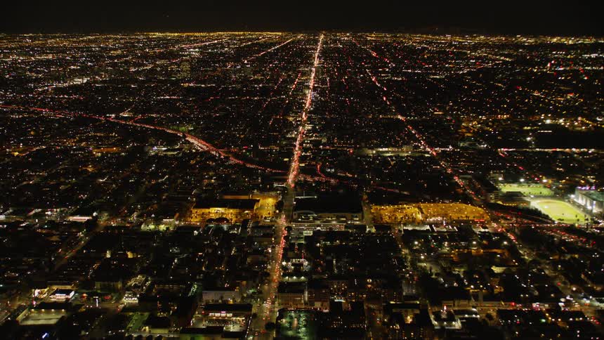 City lights illuminate the night sky